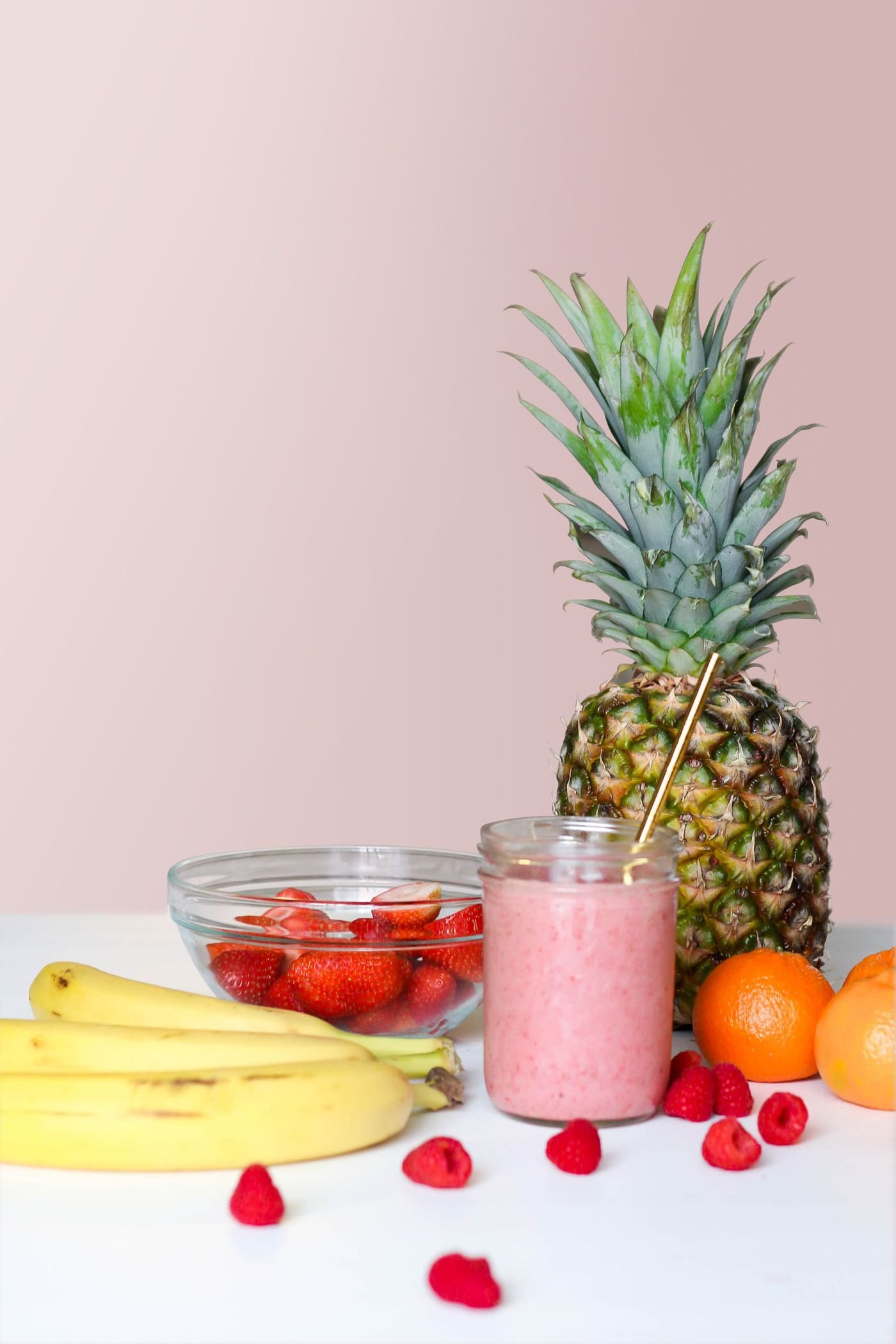 Fresh strawberry smoothie in a glass jar